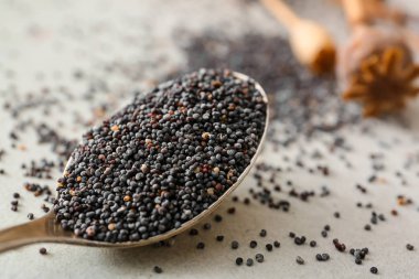 Tablo, closeup haşhaş tohumu kaşıkla