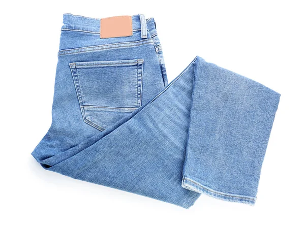 Snygga jeans byxor på vit bakgrund — Stockfoto