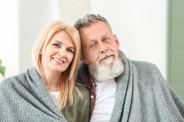 Happy elderly couple resting at home — Stock Photo, Image