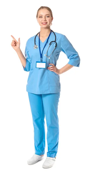 Jovem assistente médico em fundo branco — Fotografia de Stock