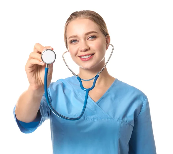 Young medical assistant with stethoscope on white background — Stock Photo, Image
