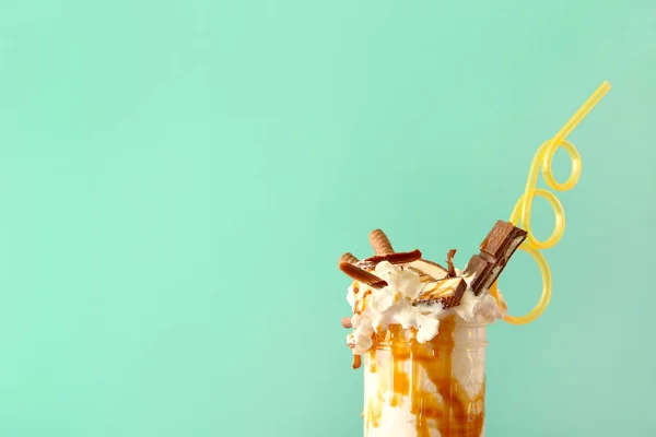 Delicious freak shake on color background — Stock Photo, Image
