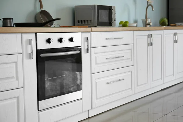 Interior of kitchen with modern oven — Stock Photo, Image