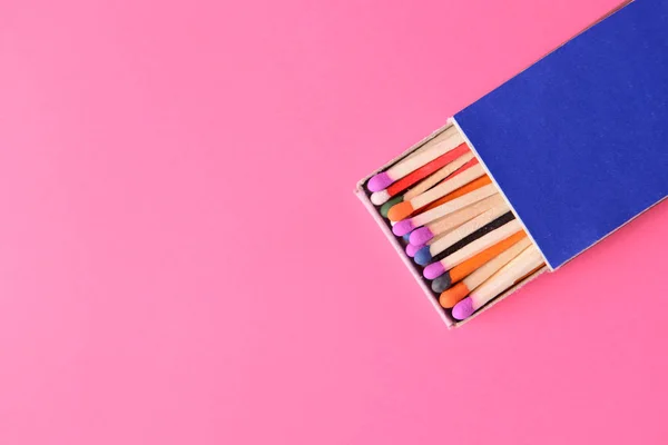 Box with matches on color background — Stock Photo, Image