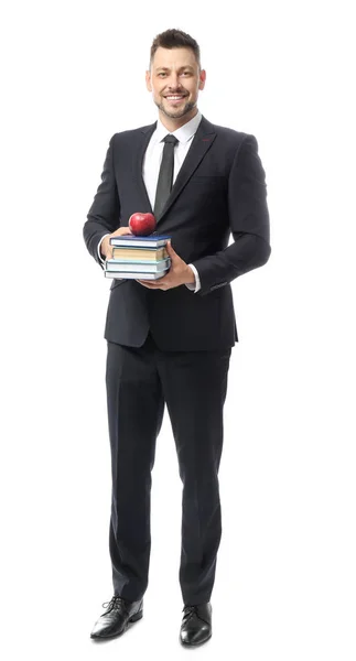 Schöner männlicher Lehrer mit Büchern auf weißem Hintergrund — Stockfoto