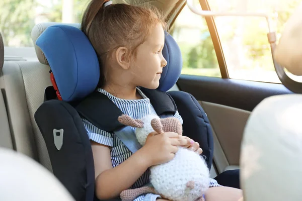 Little girl buckled in car safety seat — Stock Photo, Image