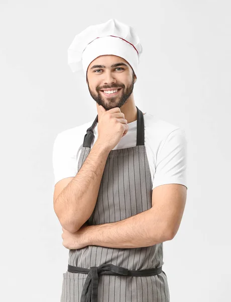 Bonito chef masculino no fundo branco — Fotografia de Stock