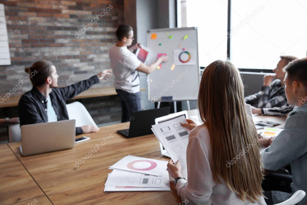 Colleagues during business meeting in office