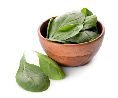 Beyaz arka plan üzerinde taze ıspanak ile Bowl