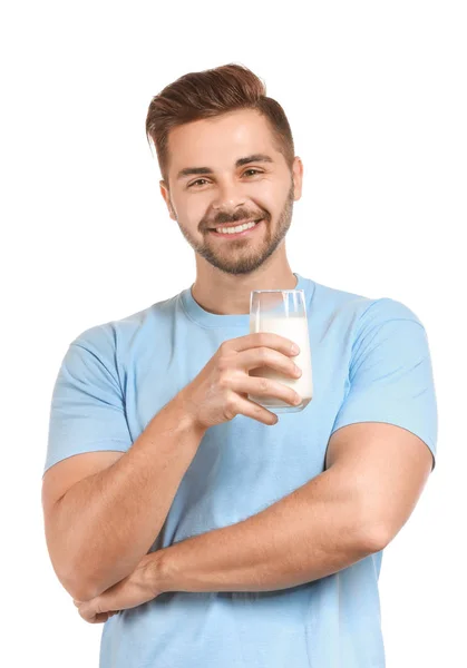 英俊的男人与玻璃美味的牛奶在白色背景 — 图库照片