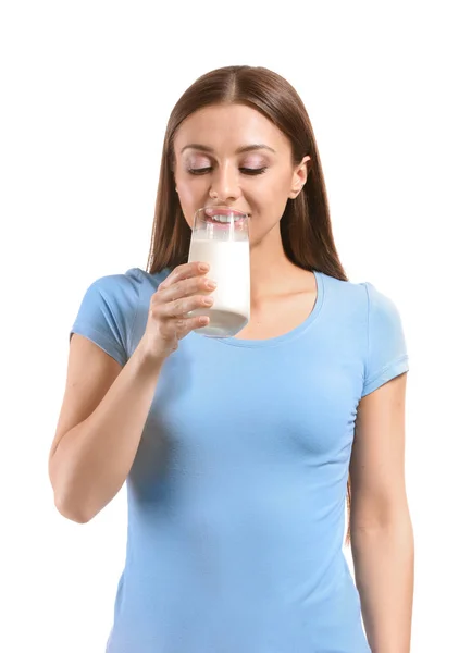 Beautiful woman drinking tasty milk on white background — Stock Photo, Image