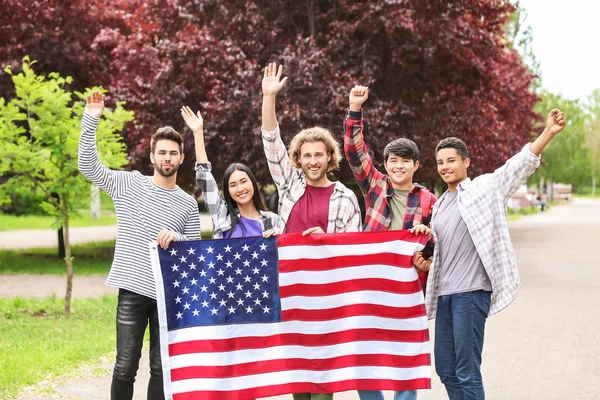 Group of students with USA flag outdoors — Stock Photo, Image