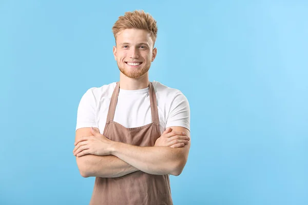 Handsome male chef on color background — Stock Photo, Image