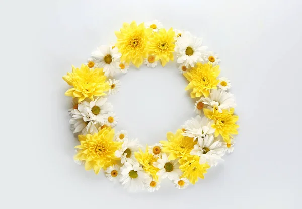 Frame made of beautiful flowers on white background — Stock Photo, Image