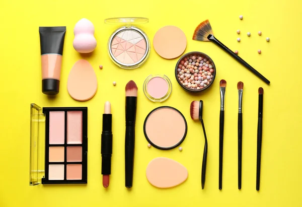 Set of cosmetics for contouring makeup on color background — Stock Photo, Image