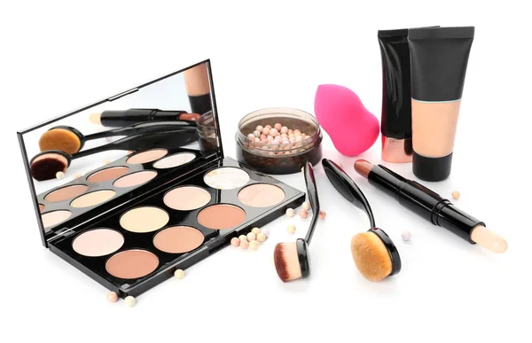 Set of cosmetics for contouring makeup on white background — Stock Photo, Image