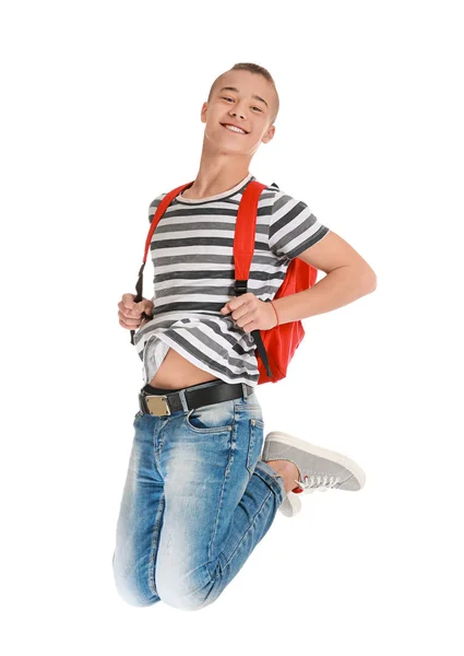 白い背景にかわいいジャンプ十代の少年 — ストック写真