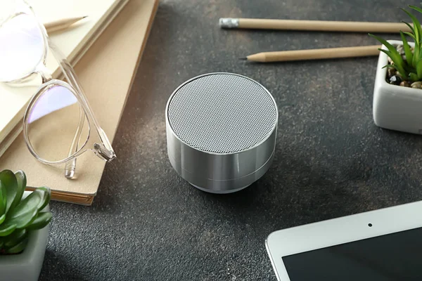 Smart home assistant device on grey table — Stock Photo, Image