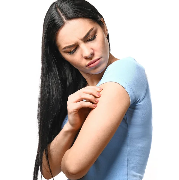 Young woman with skin allergy on white background — Stock Photo, Image