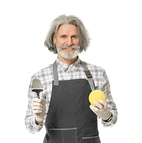 Male owner of cheese store on white background — Stock Photo, Image