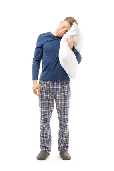 Сонный человек с подушкой на белом фоне — стоковое фото