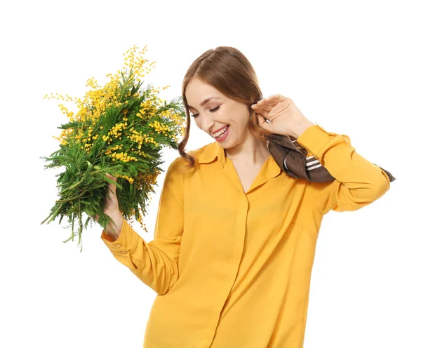 Beautiful young woman with bouquet of mimosa flowers on white background — Stock Photo, Image