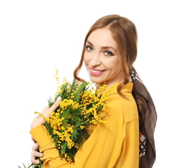 Beautiful young woman with bouquet of mimosa flowers on white background — Stock Photo, Image