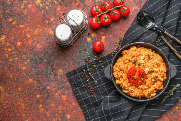 Frying pan with tasty risotto on table — Stock Photo, Image