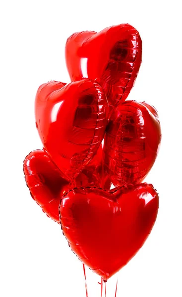 Повітряні кульки у формі серця на білому тлі — стокове фото