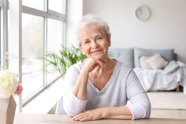 Portrait of senior woman at home — Stock Photo, Image
