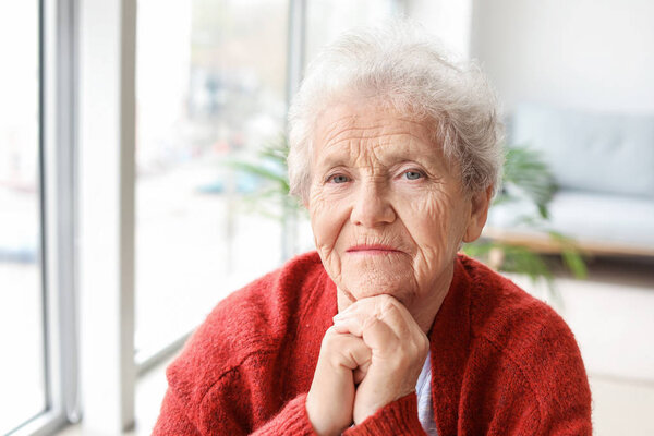 Portrait of senior woman at home
