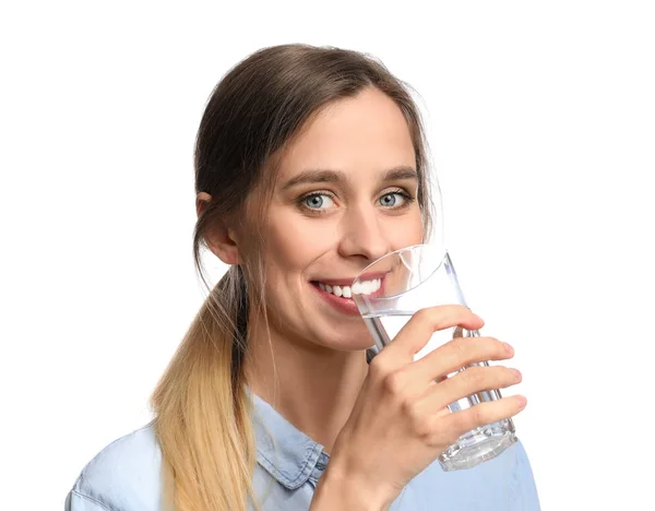Beautiful young woman drinking water on white background — Stock Photo, Image