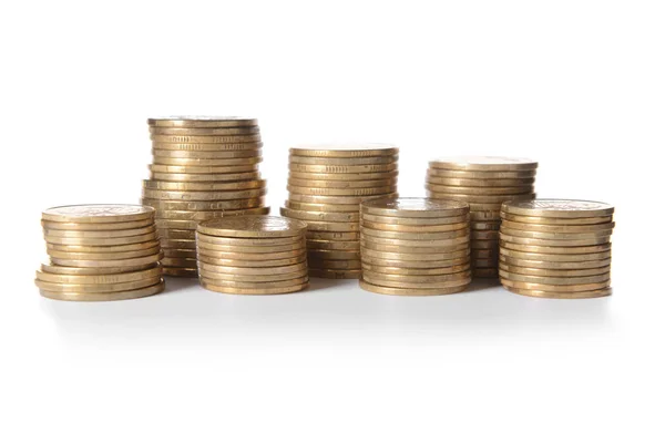 Stacks of golden coins on white background — Stock Photo, Image