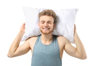 Beyaz arka planda yastık ile yakışıklı adam