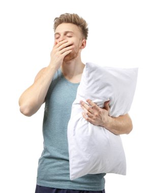Beyaz arka planda yastık ile Sleepy adam