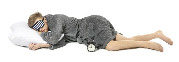 Hombre dormido con máscara y almohada sobre fondo blanco — Foto de Stock