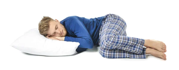 Hombre dormido guapo con almohada sobre fondo blanco —  Fotos de Stock