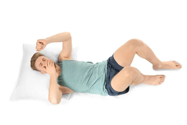 Handsome sleepy man in bed — Stock Photo, Image