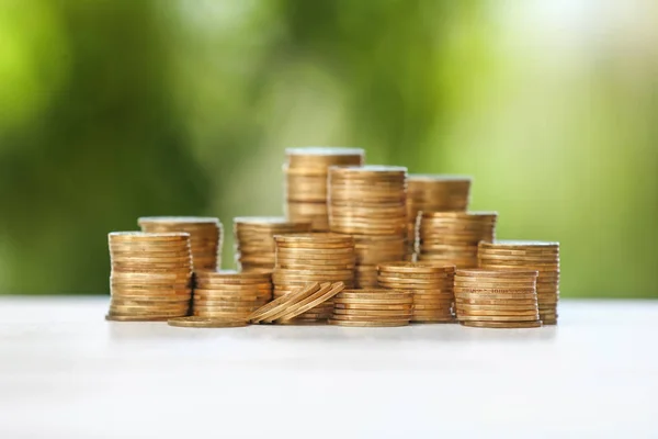 Golden coins on table. Money savings concept — Stock Photo, Image