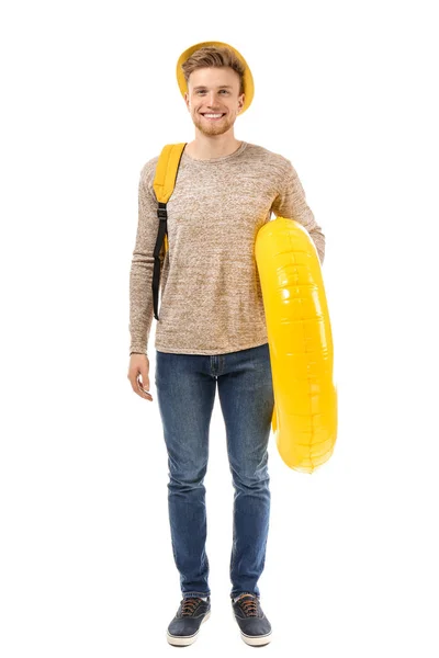 Young tourist with inflatable ring on white background — Stock Photo, Image