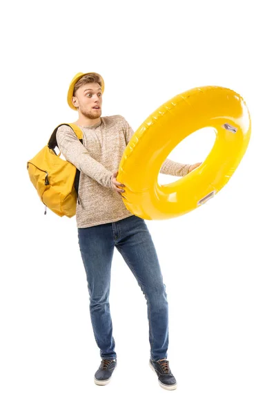 Funny young tourist with inflatable ring on white background — Stock Photo, Image