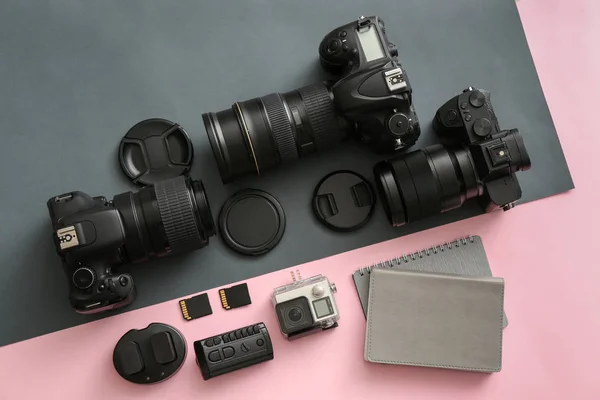 Modern equipment of professional photographer on color background — Stock Photo, Image