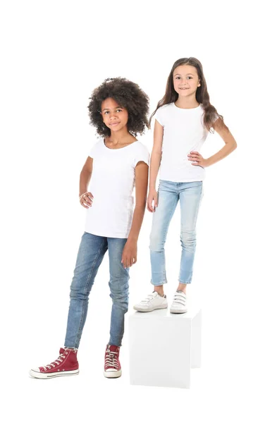 Snygga tjejer i jeans på vit bakgrund — Stockfoto
