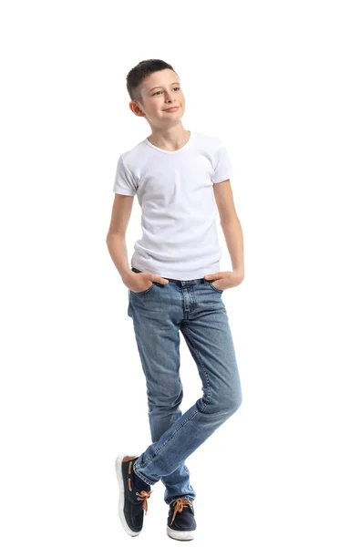 Snygg pojke i jeans på vit bakgrund — Stockfoto