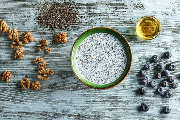 stock image Bowl with tasty chia dessert on wooden table