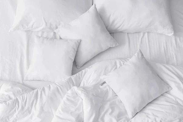 Soft pillows on bed, top view — Stock Photo, Image