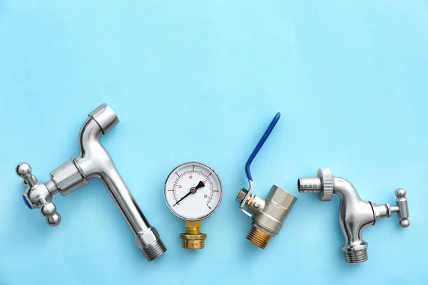 Set of plumbing items on color background — Stock Photo, Image