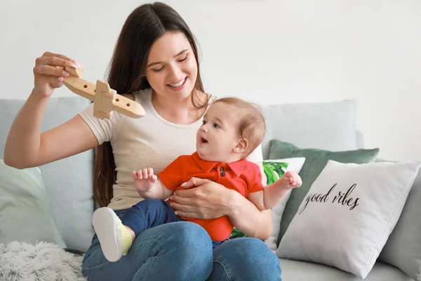 Happy mother with adorable baby boy playing at home — Stock Photo, Image