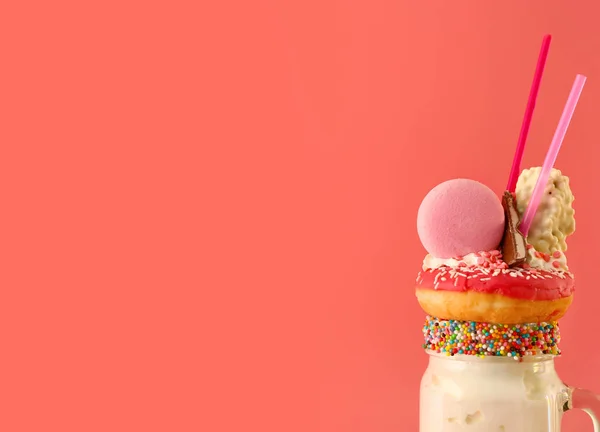 Delicious freak shake on color background — Stock Photo, Image