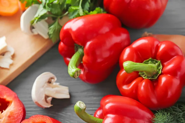 Ripe red peppers on table — Stock Photo, Image